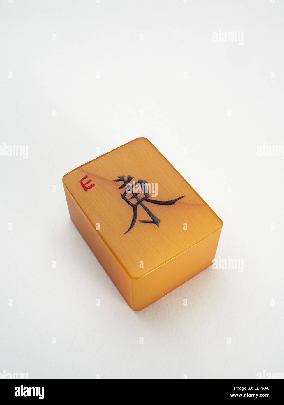 A Mahjong tile, representing the East wind. Stock Photo