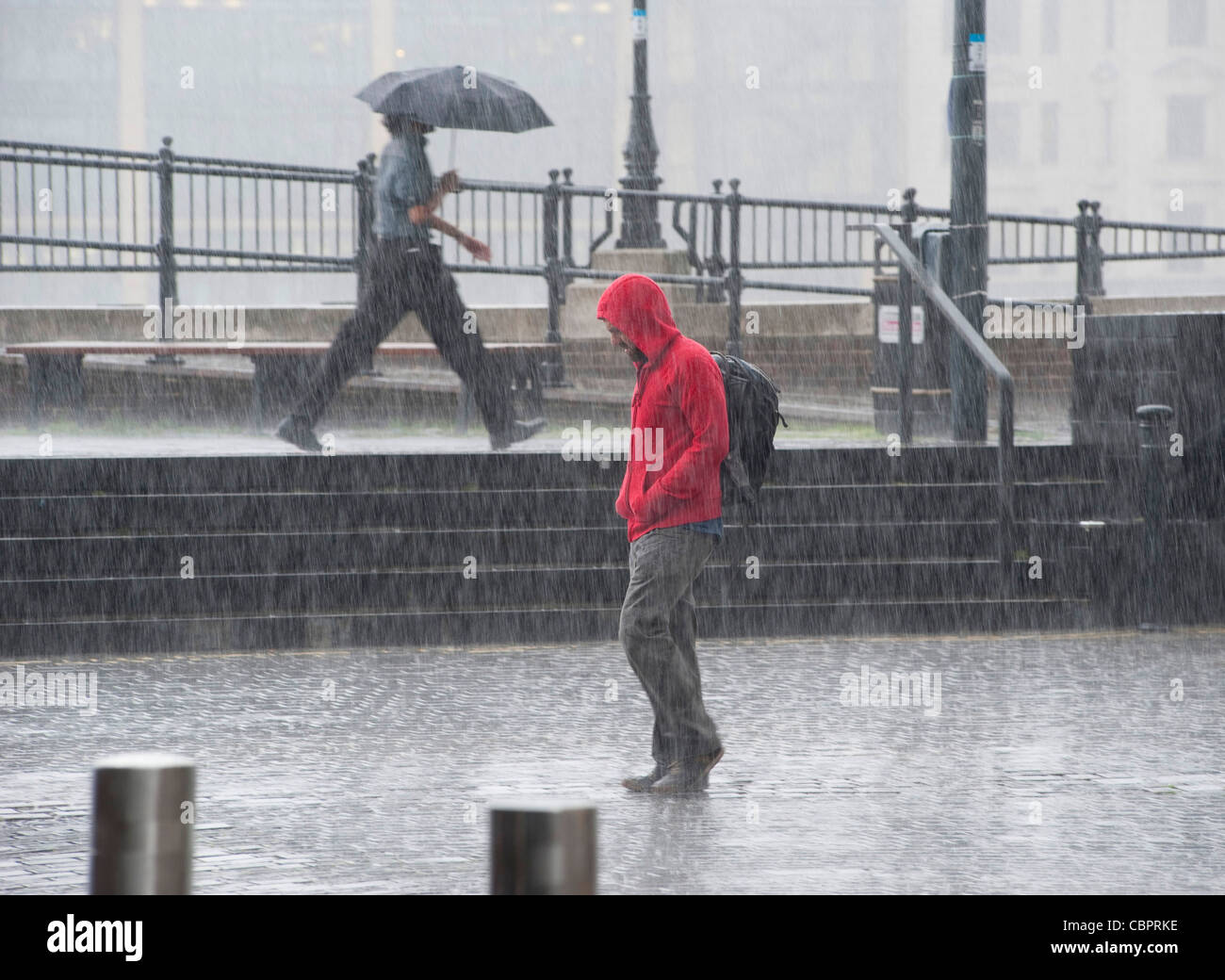 Weather,a storming rain driving onto the embankment Stock Photo - Alamy