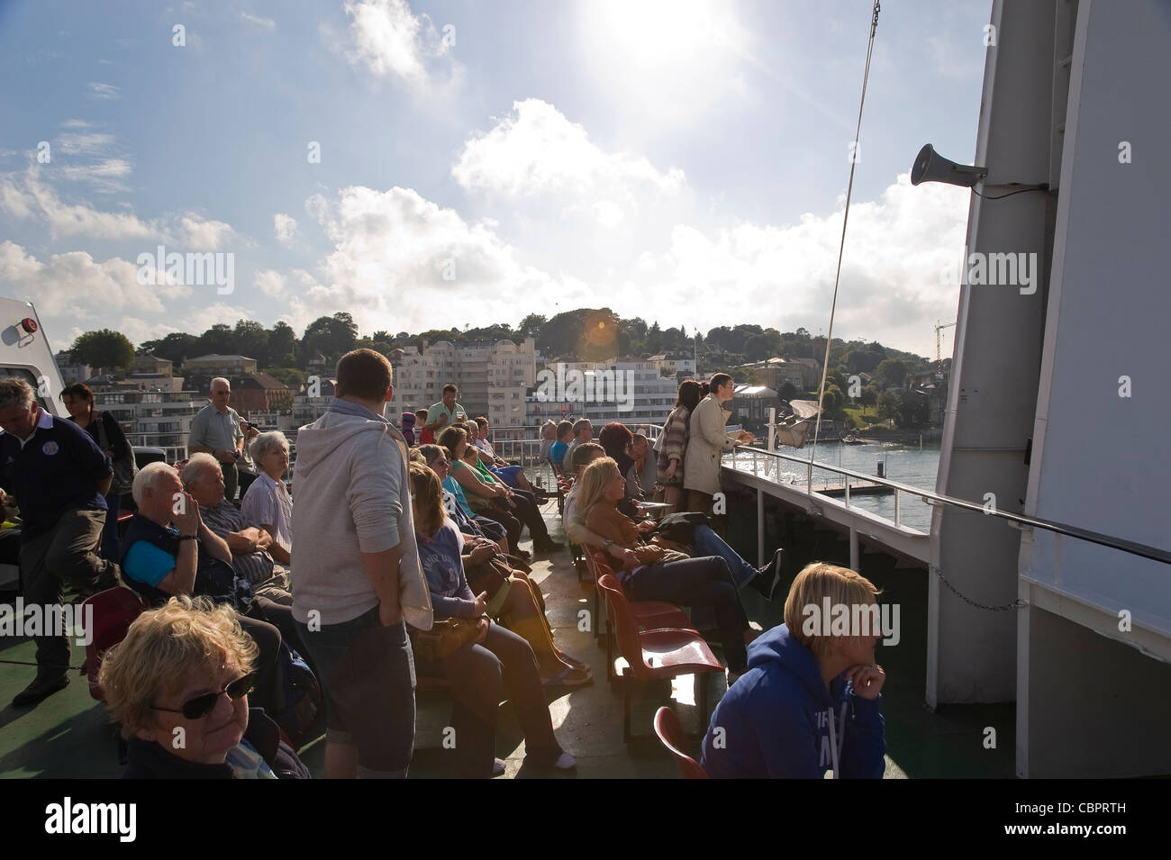 Passengers on the deck of an Isle of Wight Car Ferry leaving East Cowes, UK Stock Photo