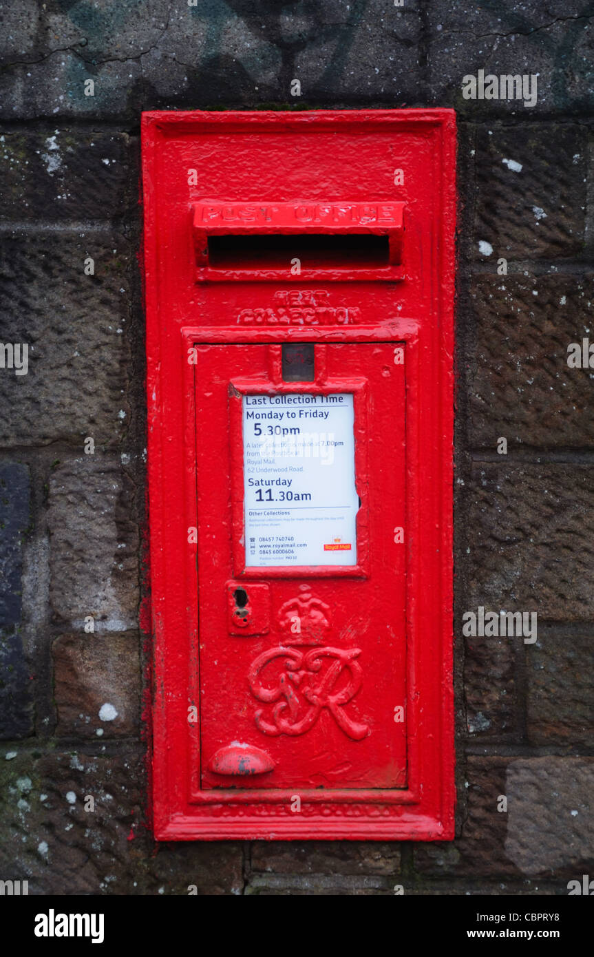 George vi Red mail box embedded in a wall in Scotland, UK Stock Photo