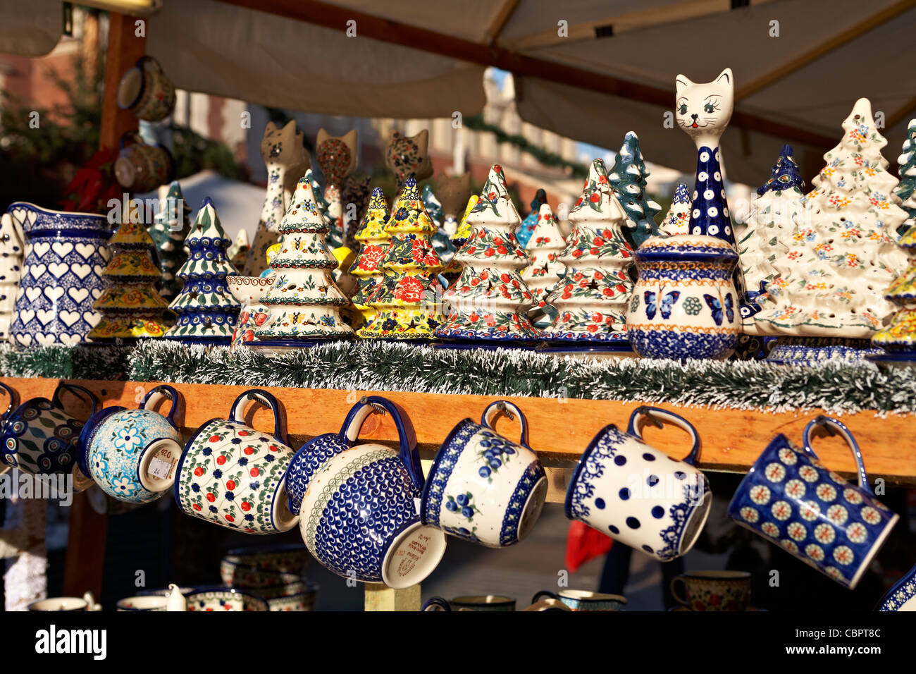 Poland Krakow Christmas Market Stall Boleslawiec pottery ceramics on sale Stock Photo