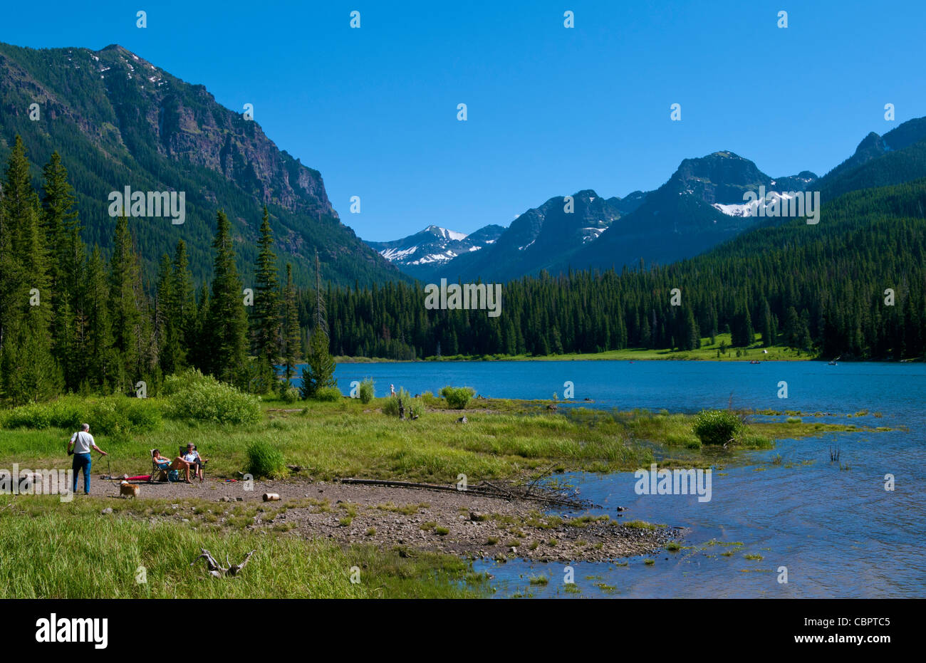 Hyalite State Park in Bozeman Montana man with dog relaxing with family