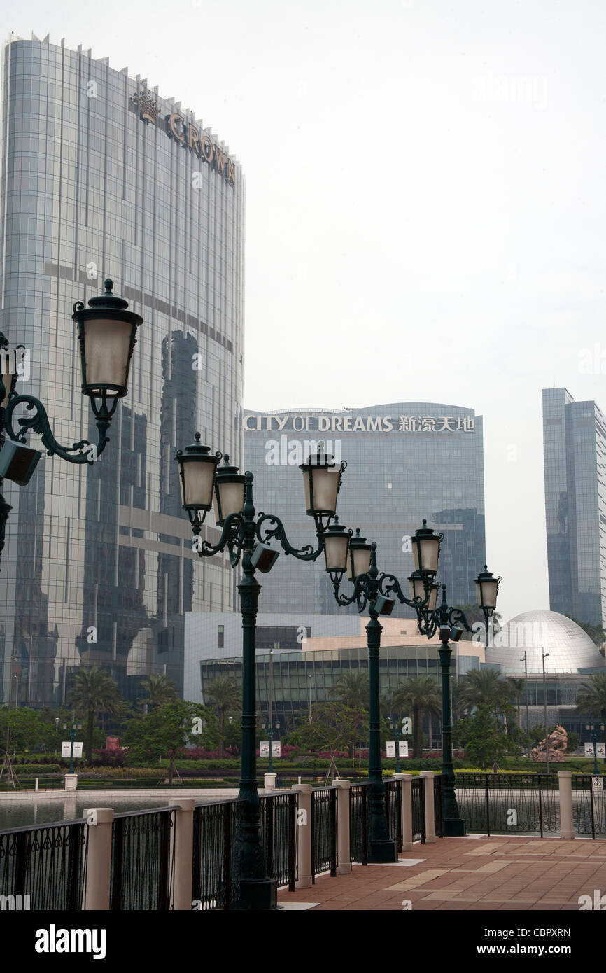 Venetian lampposts outside the Venetian Casino and Hotel Complex with the City of Dreams behind Cotai Strip Macau SAR China Stock Photo