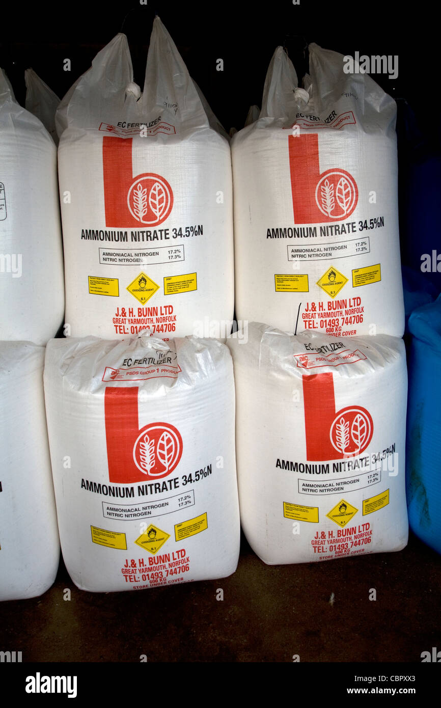 Ammonium nitrate fertiliser bags stored in a barn Stock Photo