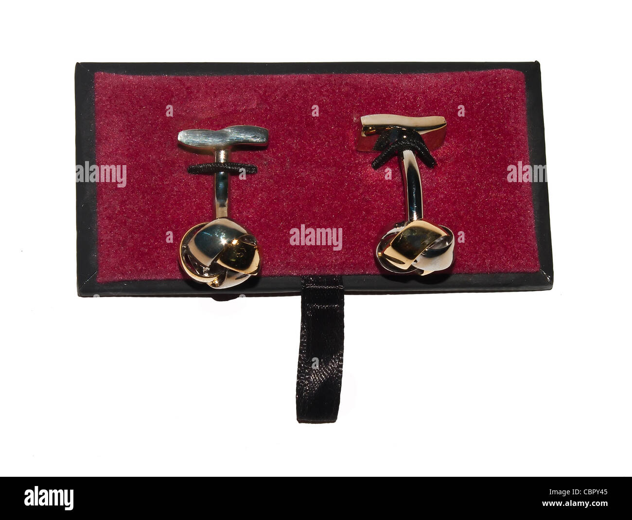 gold plated cufflinks in red container box Stock Photo