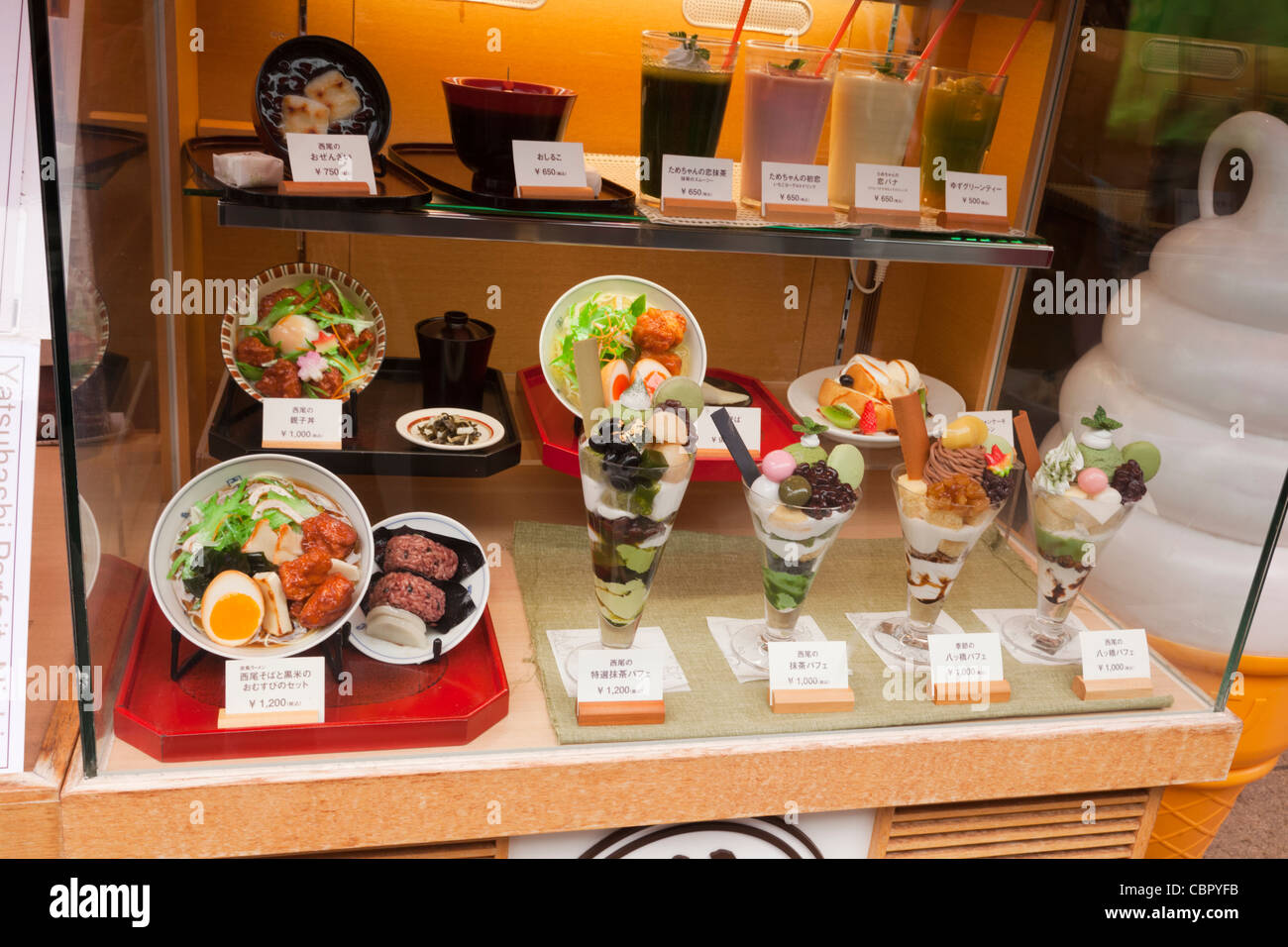 A disply of replica food in the window of a restaurant in Kyoto, Japan. Stock Photo