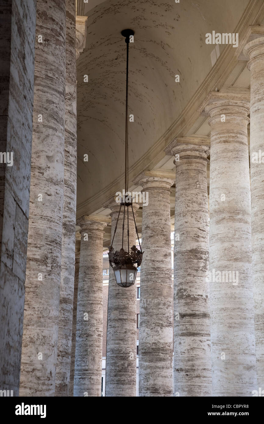 Doric Colonnades at St Peters Basilica Church by Bernini, Vatican, Rome Stock Photo