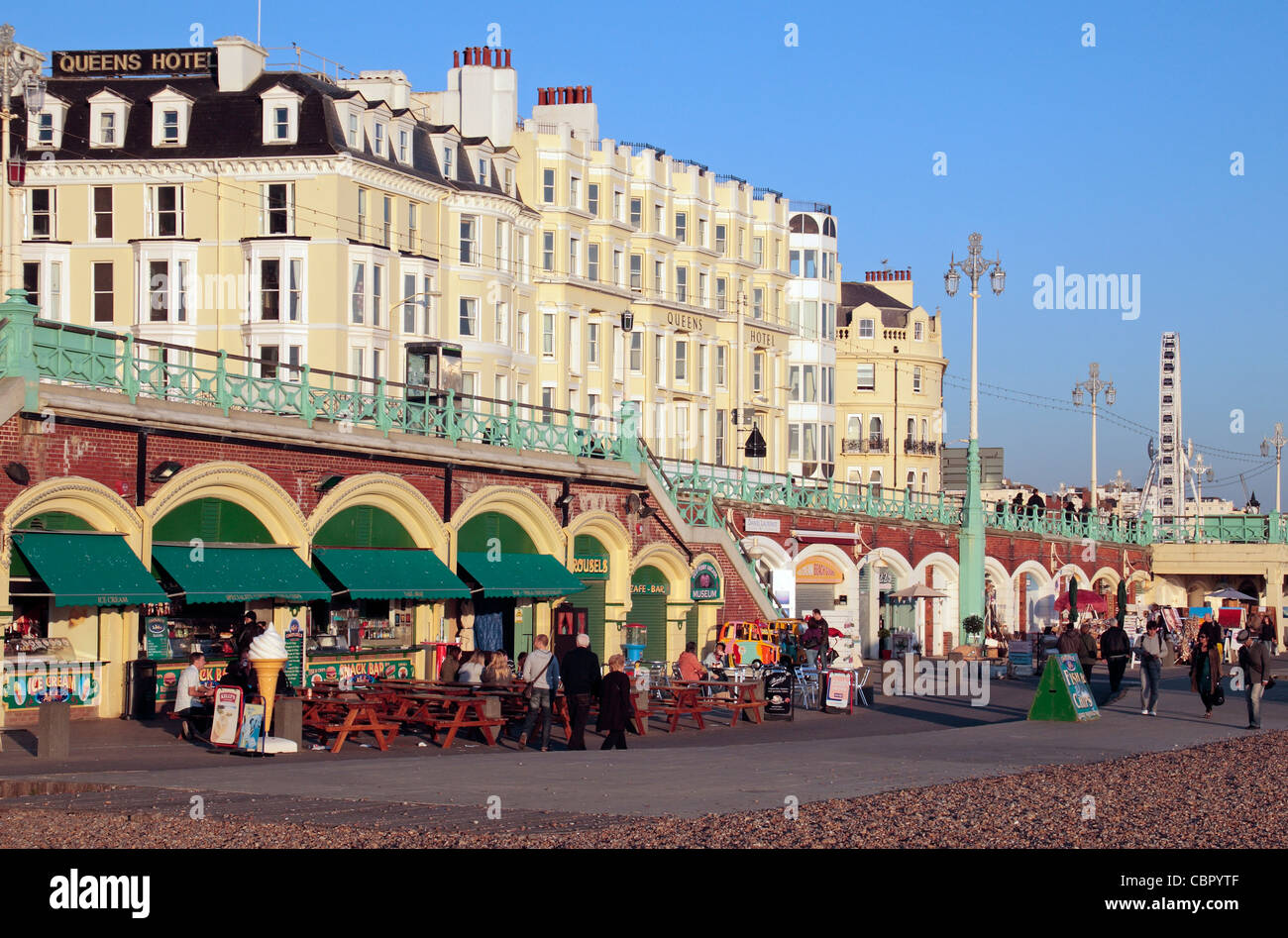 Lines of seaside stalls and shops on the beach front along Brighton seafront, East Sussex, UK. Stock Photo