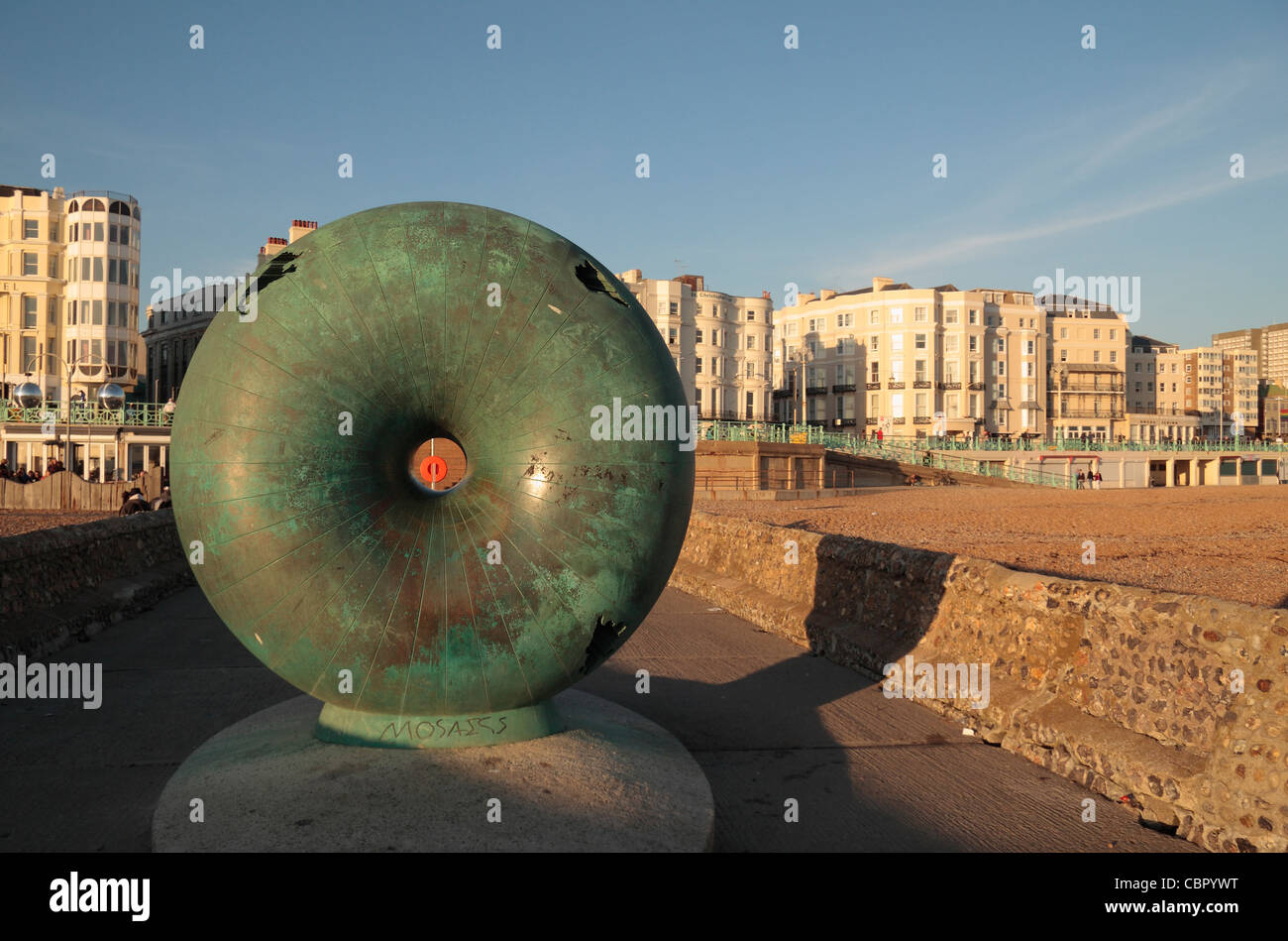 A gift from the Mayor of Naples, The Big Green Bagel (known locally as the "Seasick Doughnut"), on Brighton seafront, UK. Stock Photo