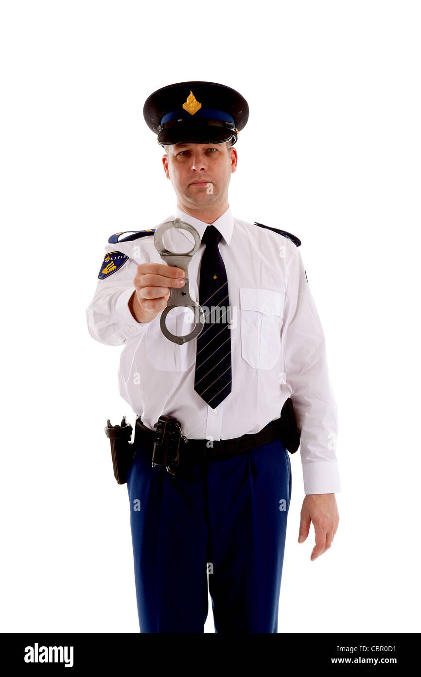 Police officer is showing handcuffs over white background Stock Photo