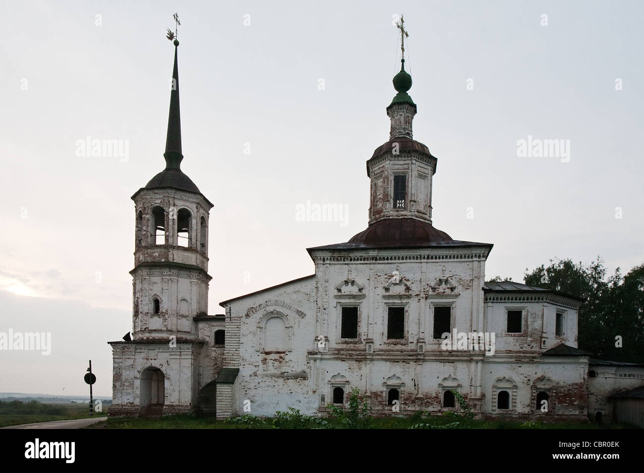 old white Russian Orthodox church closeup on grey sky background, town of Ustug the Great Stock Photo