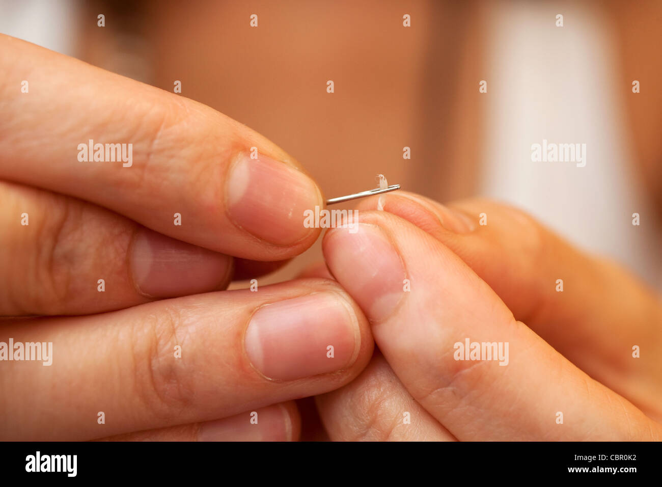 Threading needle hires stock photography and images Alamy