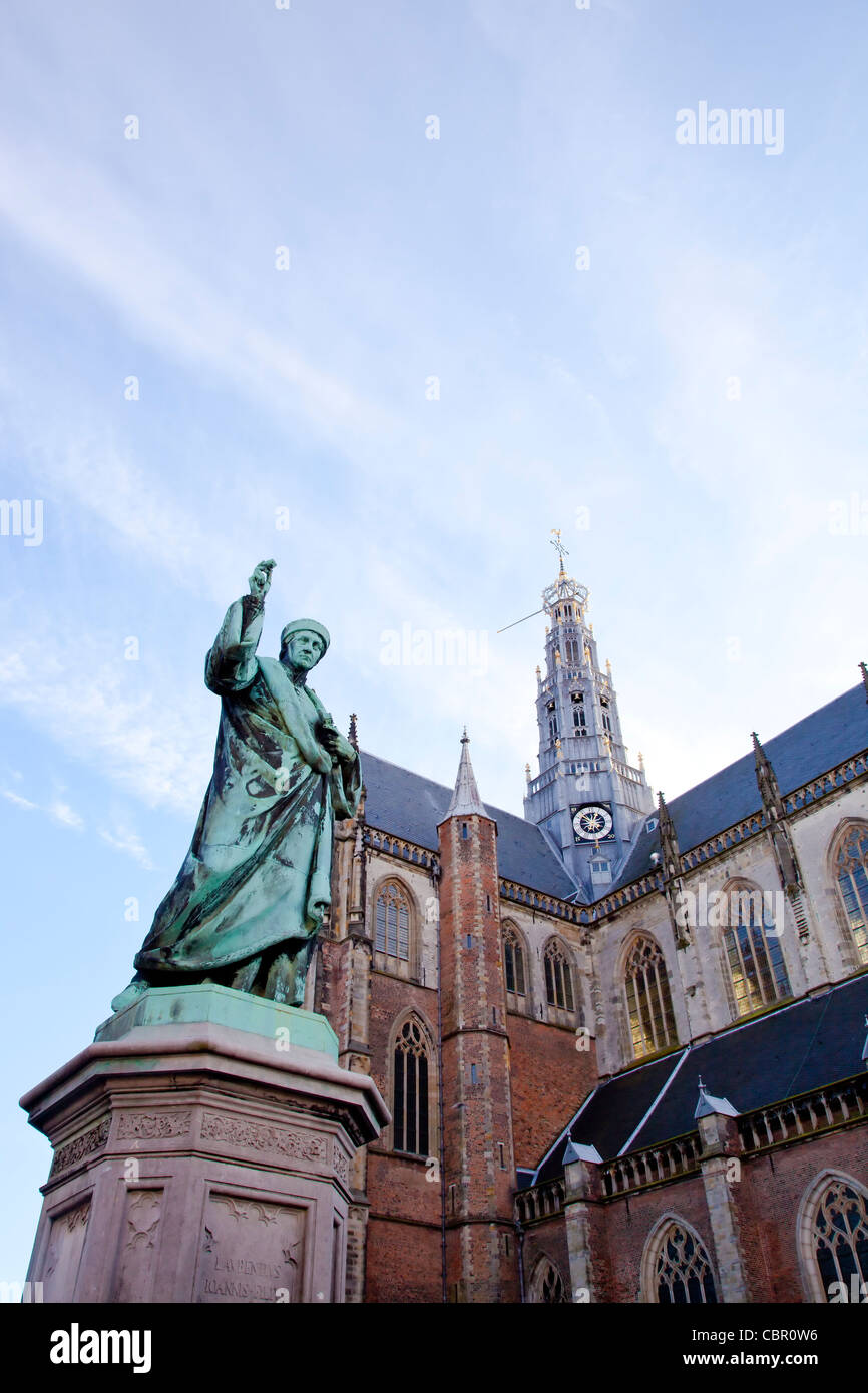 Cathedral St. Bavo with statue of printing inventor Laurens Janszoon Coster at big square Haarlem, The Netherlands Stock Photo