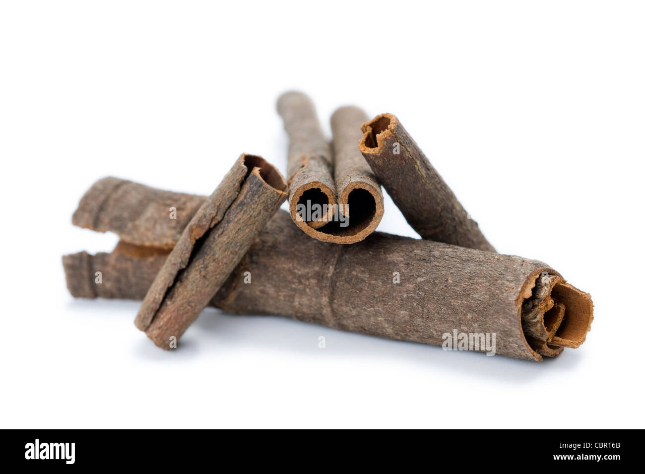 cinnamon bark arranged against a white background Stock Photo