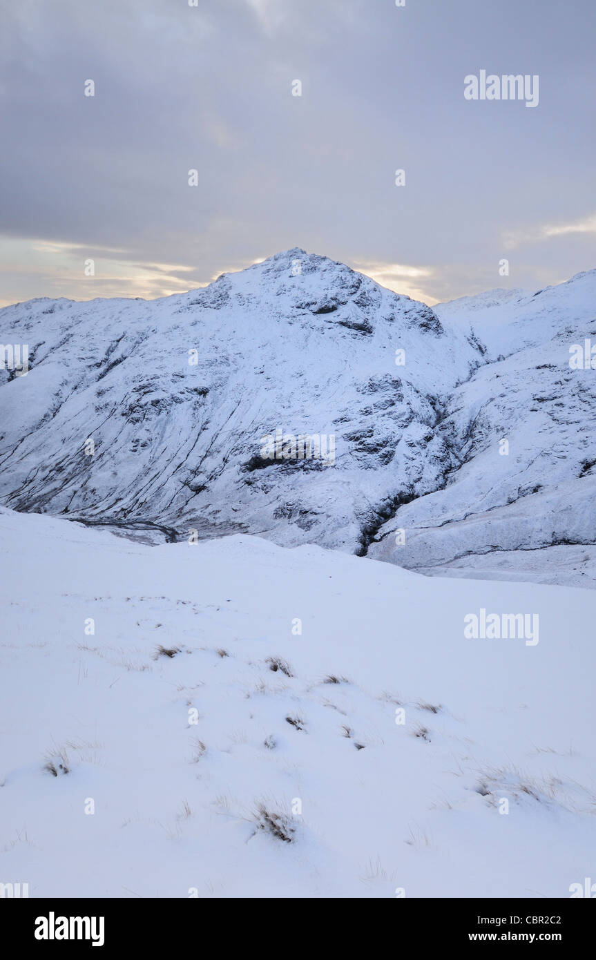 Pike O Blisco and Browney Gill under a blanket of snow from Bowfell in winter in the English