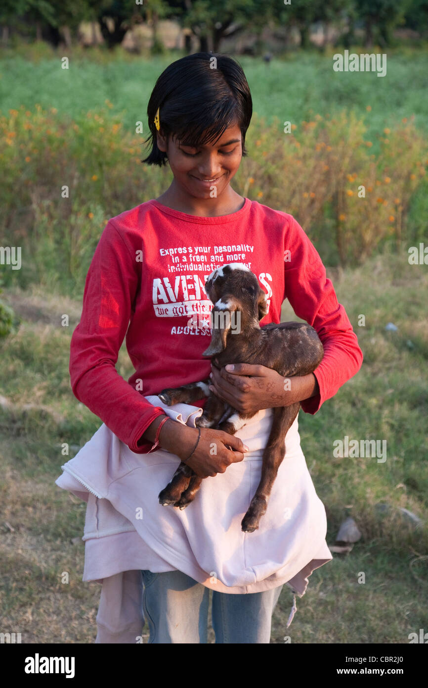 Child holding lamb hi-res stock photography and images - Alamy