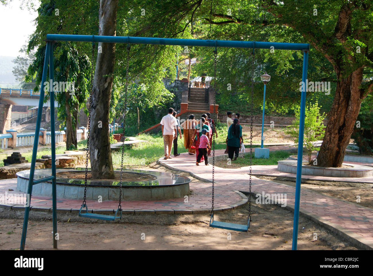 Children's park Evening scene.Swing arrangement in garden park Highlighted Stock Photo