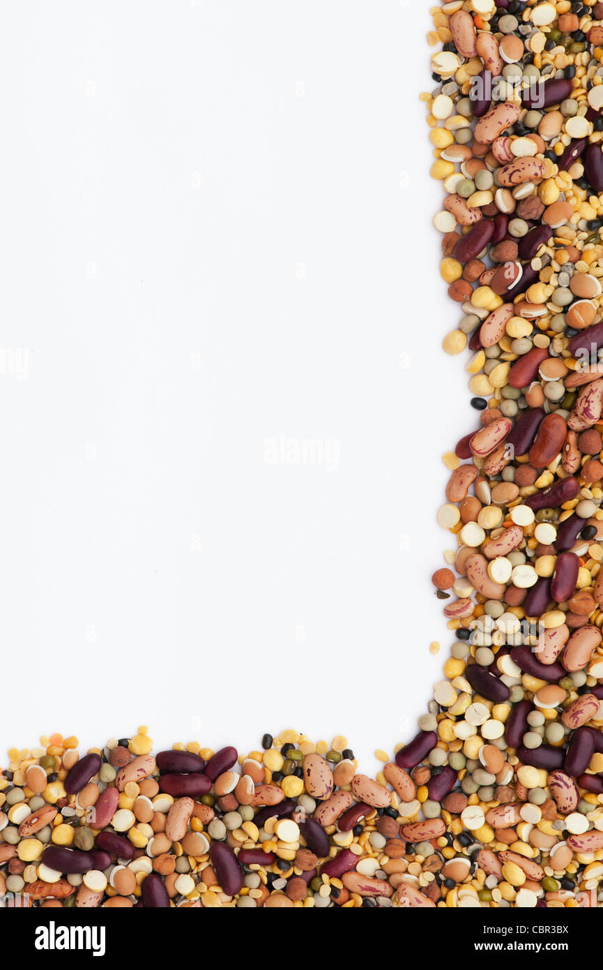 Pulses, seeds, bean and lentil frame pattern on white background Stock Photo