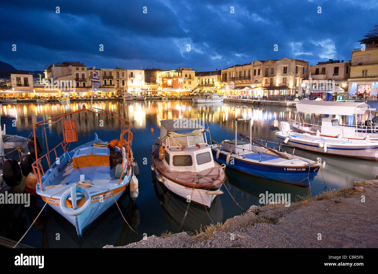 Dusk over the Venetian harbour of Rethymnon, Crete, Greece. Stock Photo