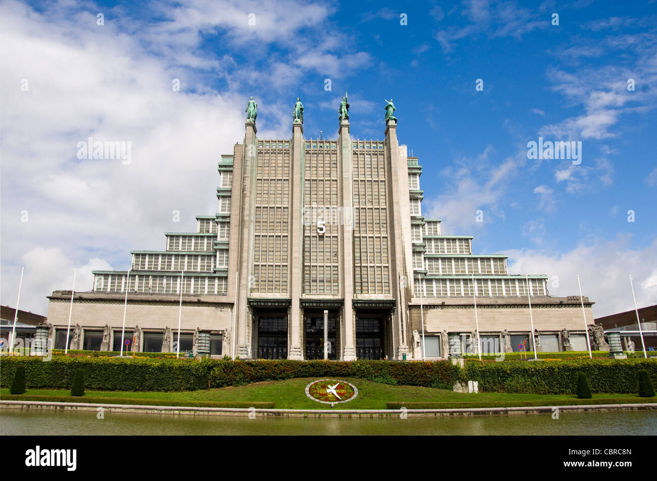 Horizontal wide angle of the Art Deco Grand Palace aka Palais de Expositions in Heysel Park, Brussels on a sunny day. Stock Photo