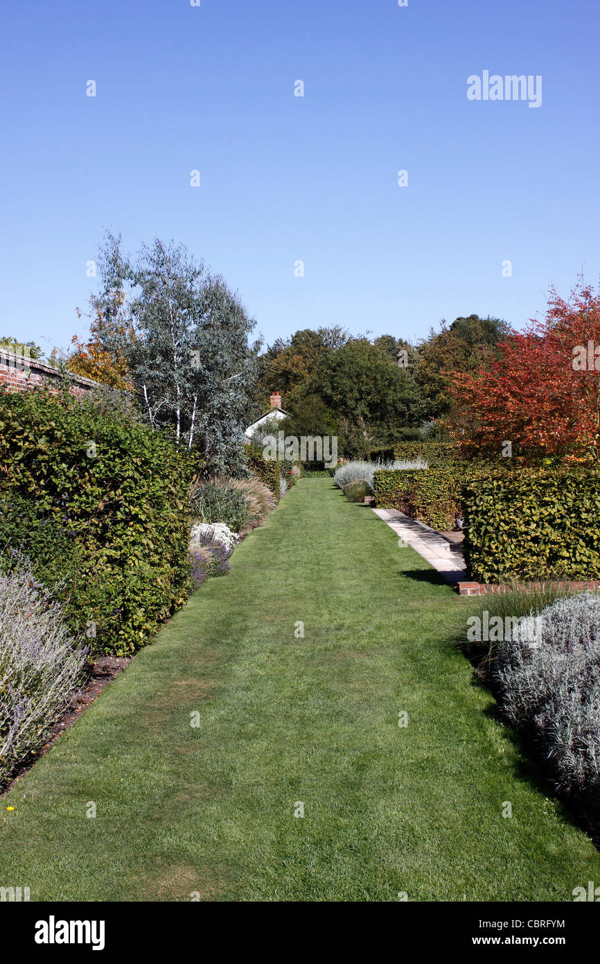 COLOURFUL AUTUMN FLOWER BEDS WITHIN THE WALLED GARDEN AT MARKS HALL IN