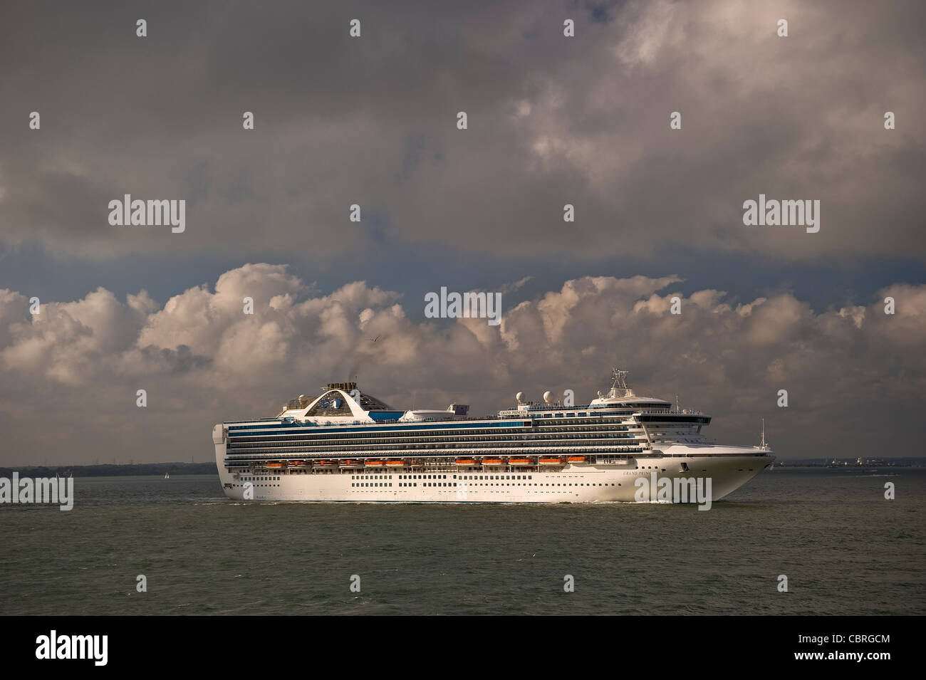 A large Cruise ship on the Solent departing Southampton Docks, Hampshire, UK Stock Photo