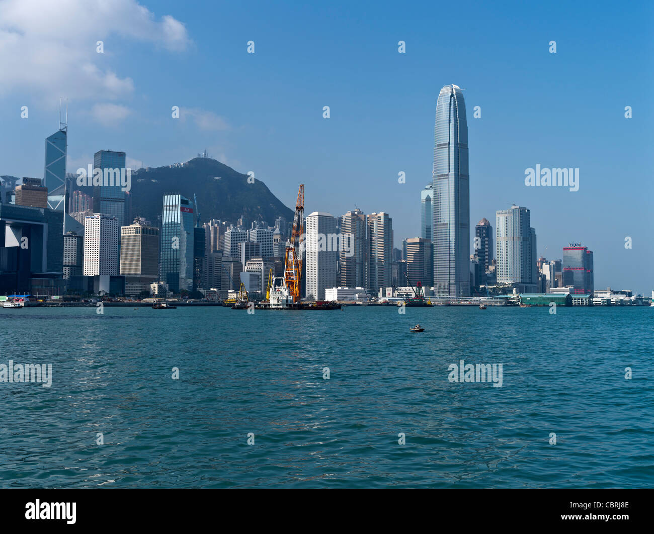 dh Victoria Harbour CENTRAL HONG KONG The Peak HK buildings skyline skyscrapers IFC 2 city day cityscapes blue sky Stock Photo