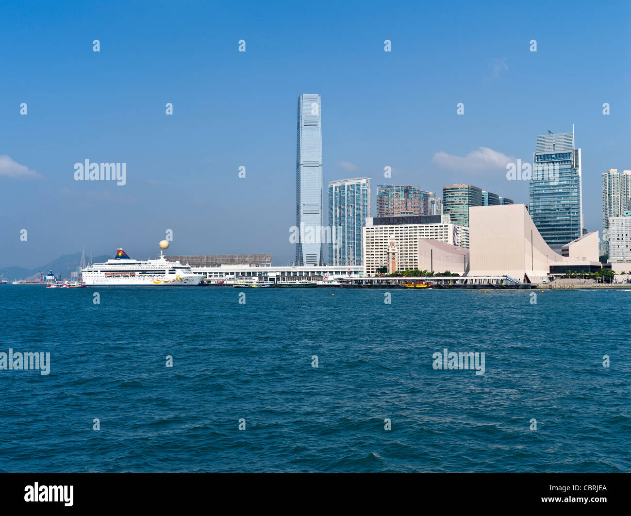 dh  TSIM SHA TSUI HONG KONG Waterfront buildings skyline skyscrapers ICC HKCC Ocean Terminal ship Stock Photo