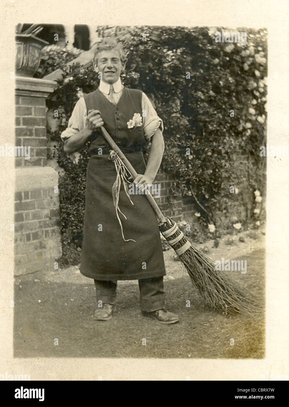 Portrait postcard of gardener with besom Stock Photo