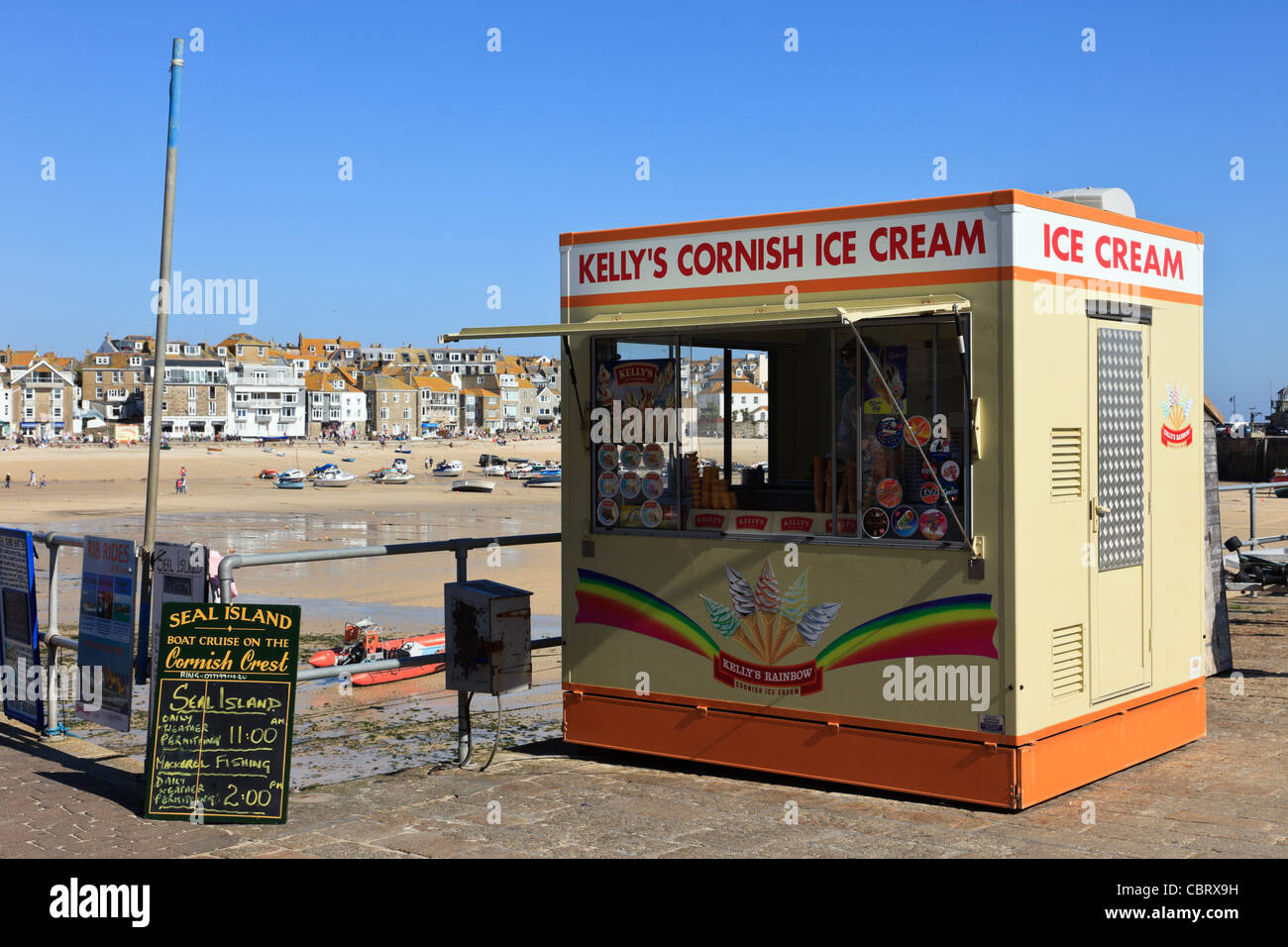 Kelly's Cornish ice cream parlour selling ice creams on the seafront