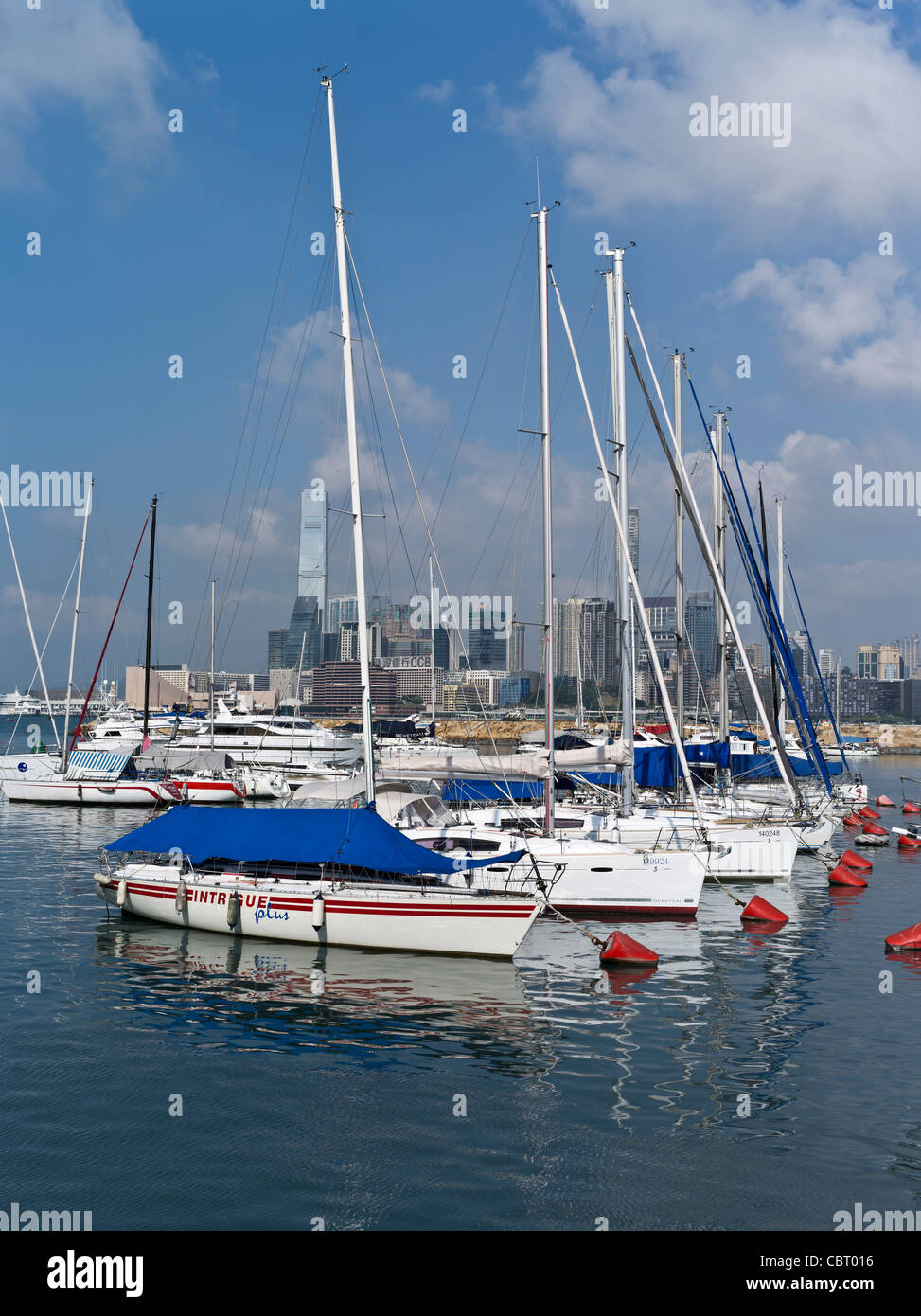 dh  CAUSEWAY BAY HONG KONG Royal Hong Kong Yacht club sailing boats in anchorage marina yachts Stock Photo