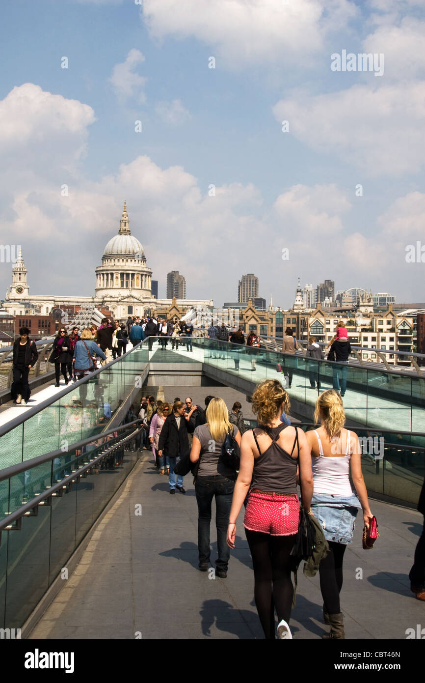 Millenium Bridge with St Paul's Cathedral and City of London skyline beyond. London, UK Stock Photo