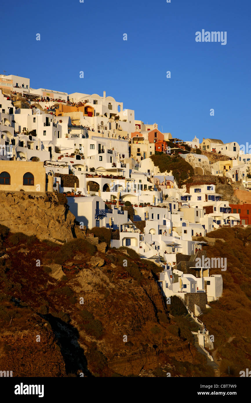 View of the eastern part of Oia village around sunset. Santorini island, Cyclades, Greece Stock Photo