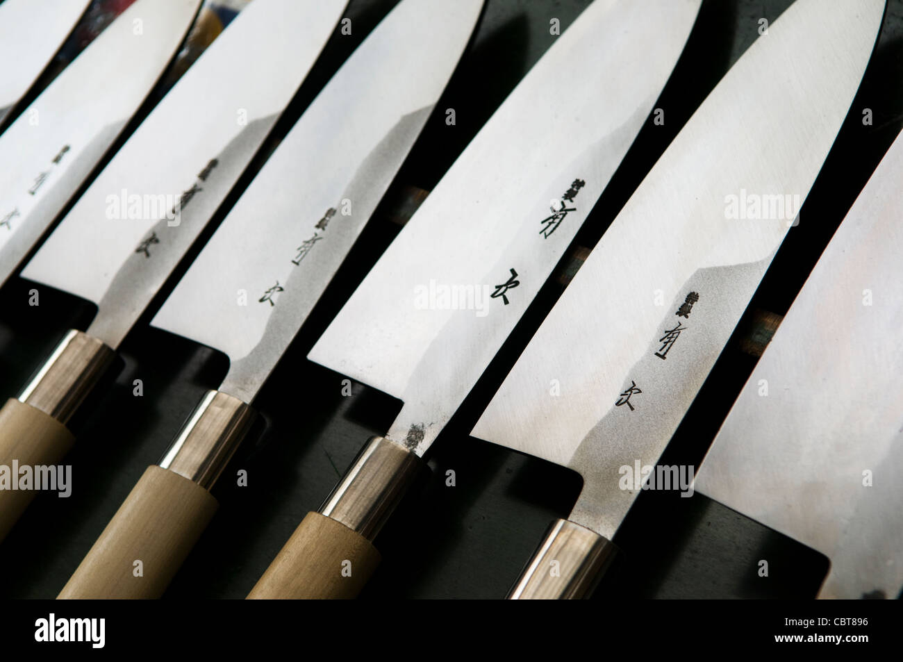 Steel knives for sale at Tsukiji fish market Tokyo Japan Stock Photo