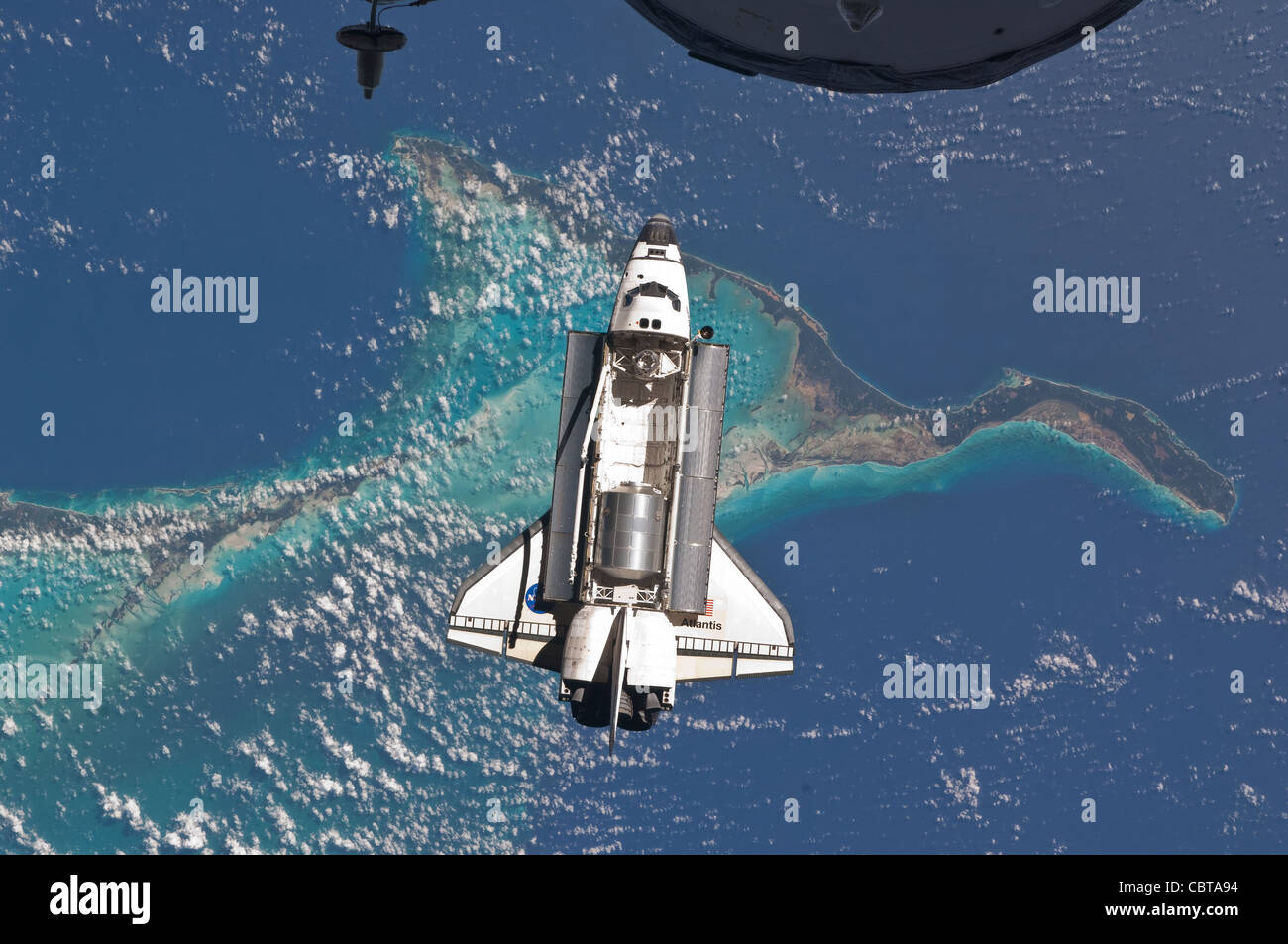 Space Shuttle Atlantis over Bahamas July 10, 2011 Stock Photo