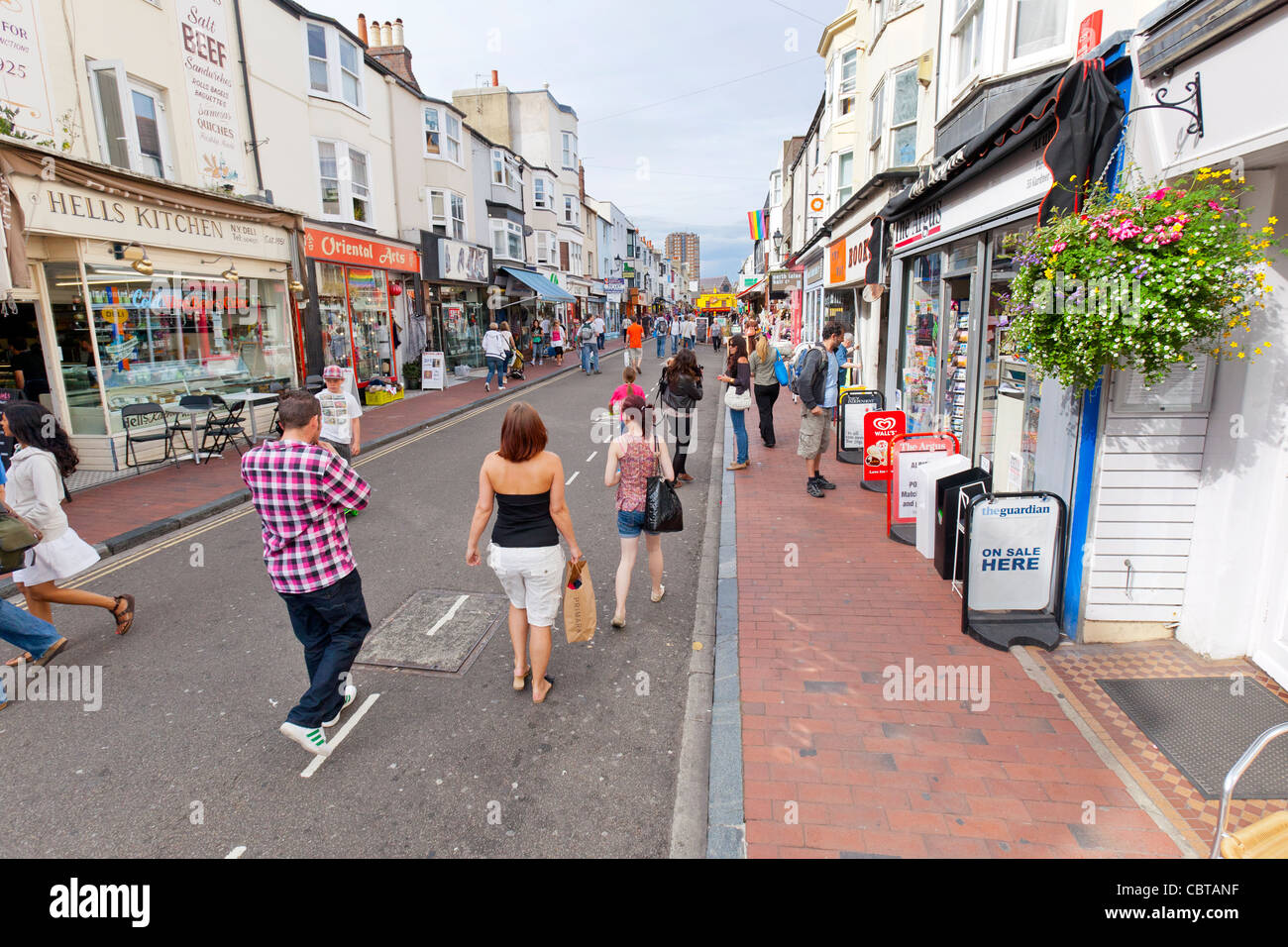 Shoppers walking on Gardner Street in downtown Brighton, England. Stock Photo