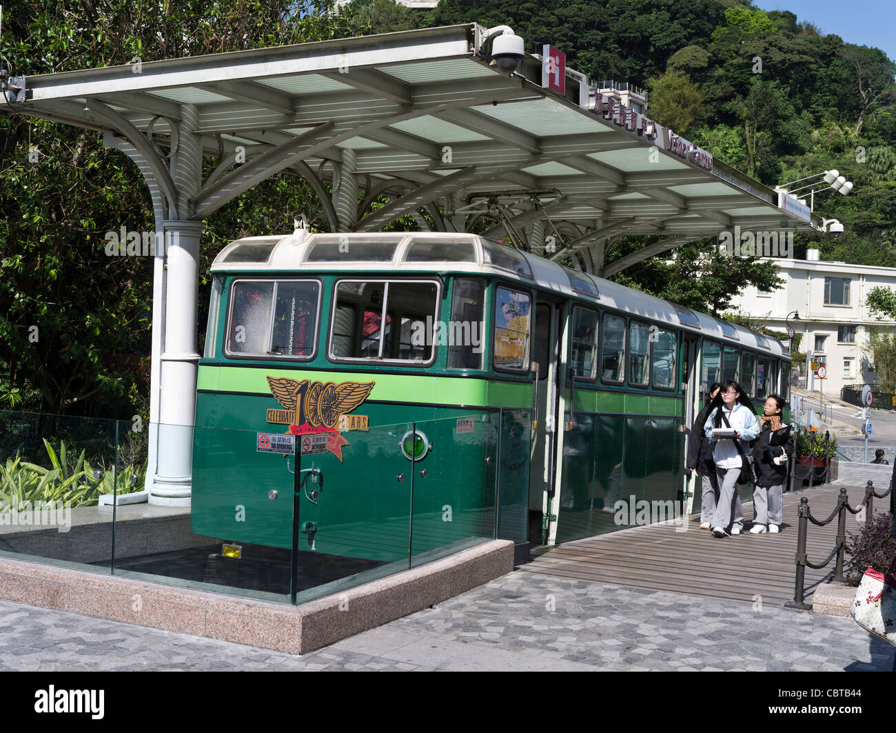 dh  VICTORIA PEAK HONG KONG Chinese tourists at Peak Tram Tourist information Centre railway funicular Stock Photo