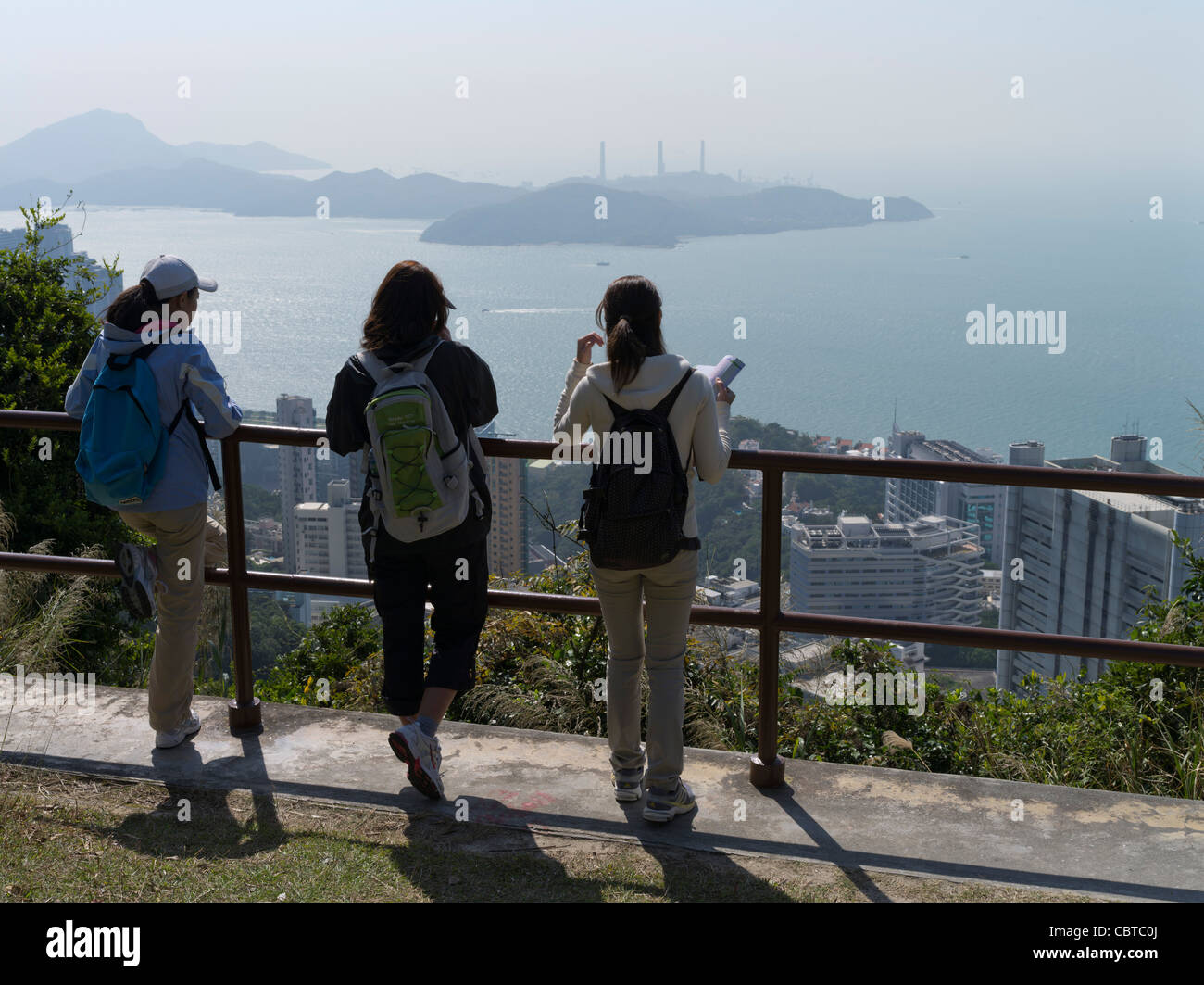 dh Pok Fu Lam Country Park POK FU LAM HONG KONG ISLAND Three Japanese tourist girls tourists young people female trail view Stock Photo