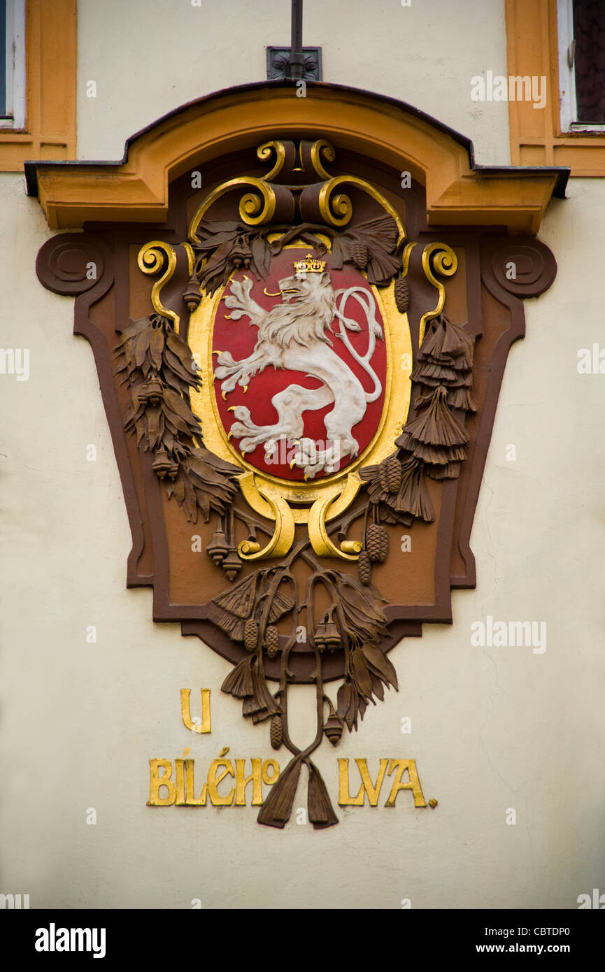Lion Building Sign Lion symbol wooden on wall building Prague Stock Photo - Alamy