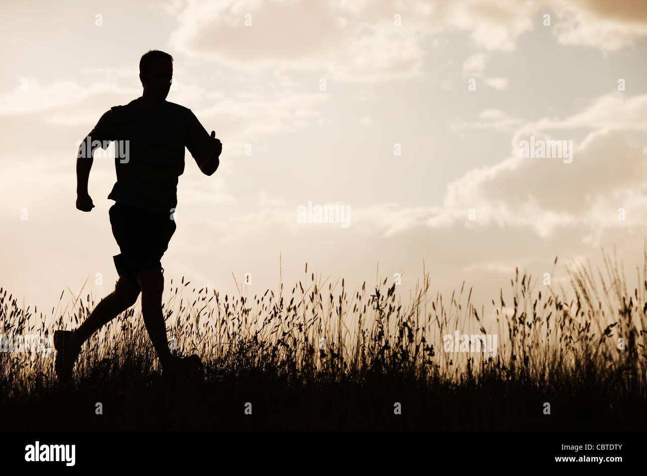Running Single Man Man running one back view hi-res stock photography and images - Alamy