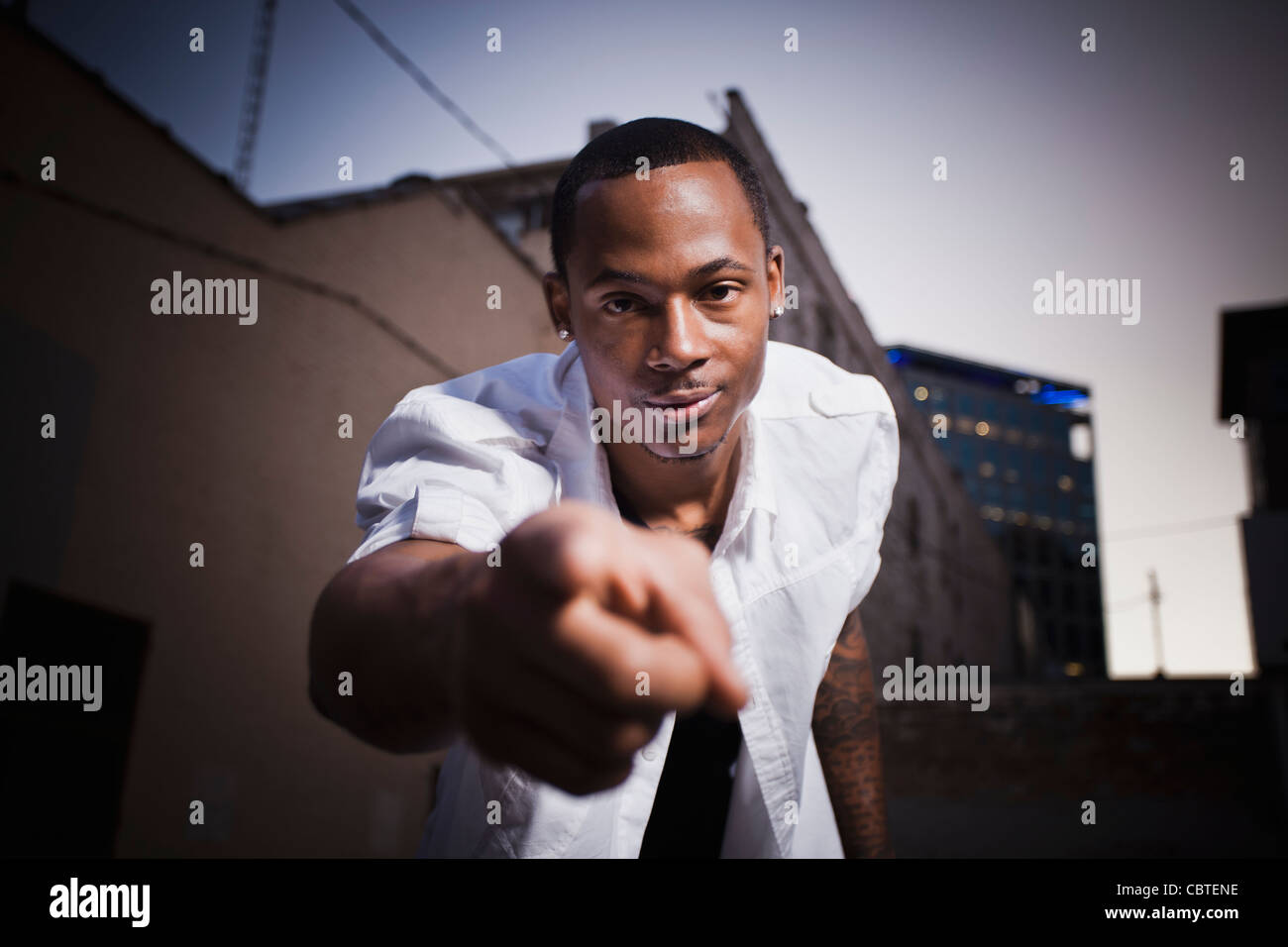 Portrait pointing black man hi-res stock photography and images - Alamy