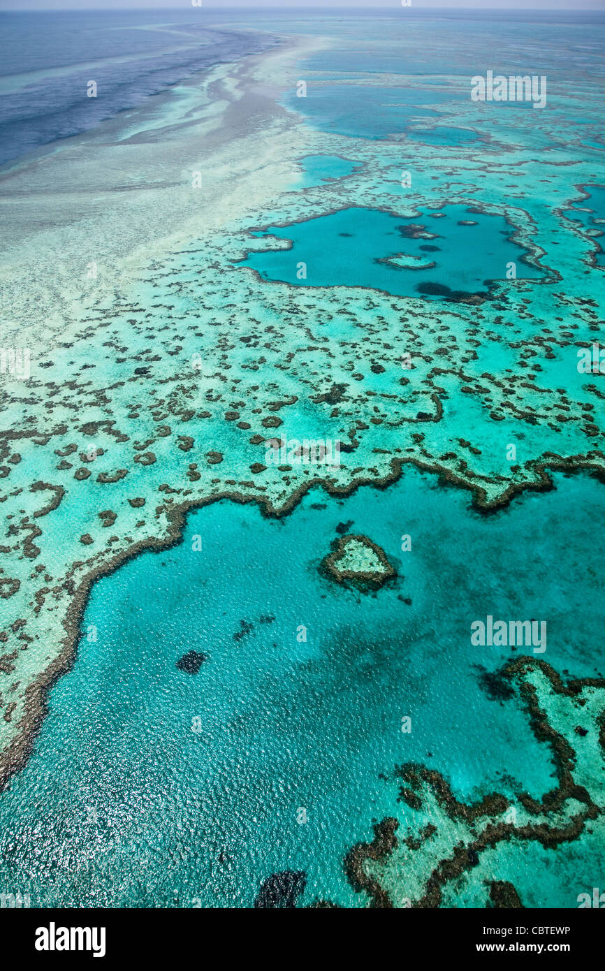 Aerial views of beautiful Heart Reef in the spectacular Great Barrier Reef near the Whitsunday Islands in Queensland, Australia. Stock Photo