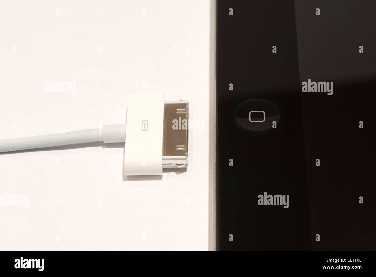 The iPad power cable Stock Photo Alamy