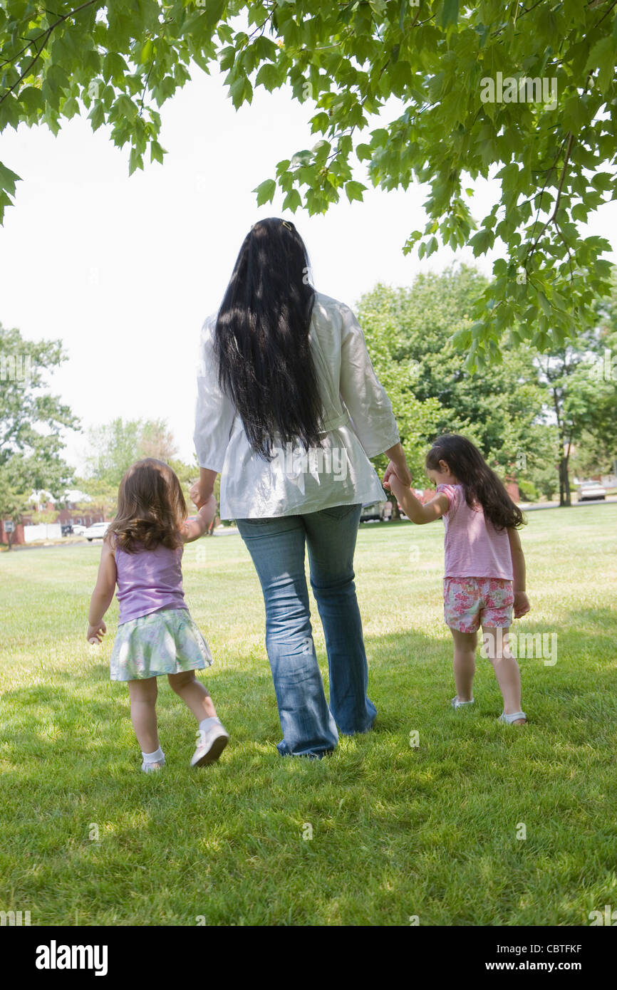 Mother 2 daughters rear view hi-res stock photography and images - Alamy