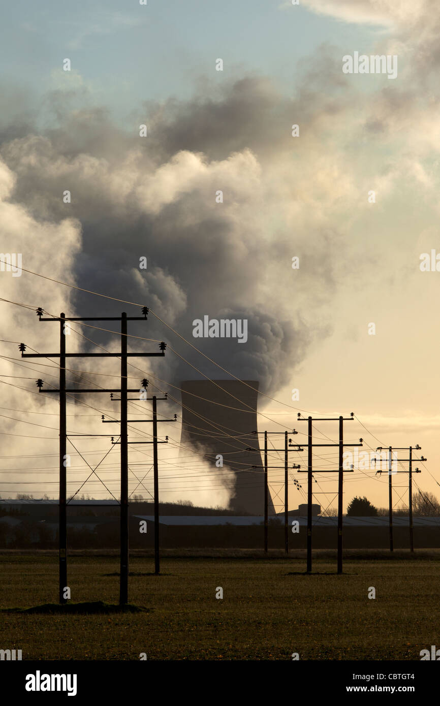 Smoke and steam rising from cooling towers of a coal fired electricity generating power station, uk Stock Photo