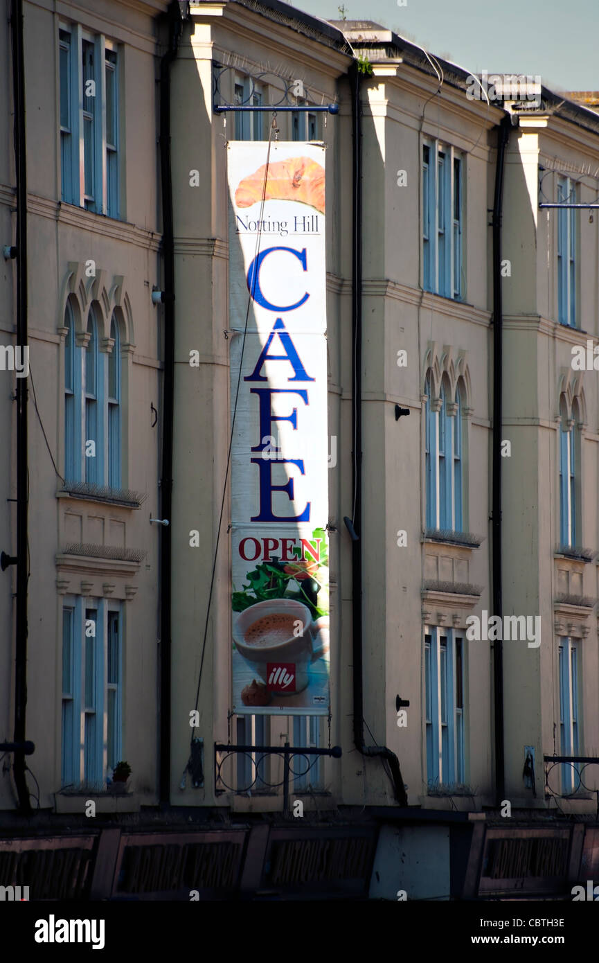 LONDON, UK - OCTOBER 01, 2011:    Hanging Banner sign for Cafe in the Portobello Road, London Stock Photo