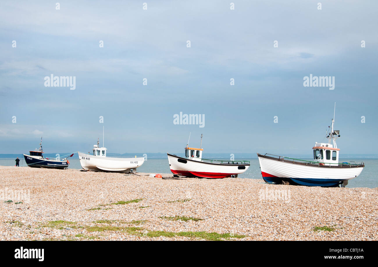 Beach four fishing boats hi-res stock photography and images - Alamy