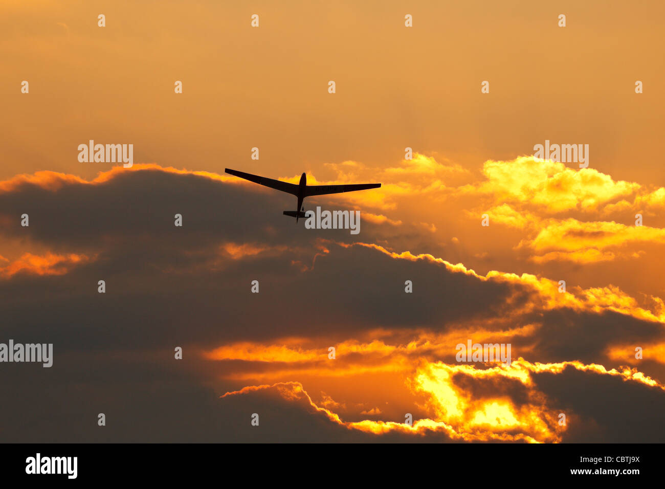 ASK13 Glider launching at sunset, Crusaders Gliding Club,  Kingsfield Airstrip, Dhekelia, Cyprus. Stock Photo