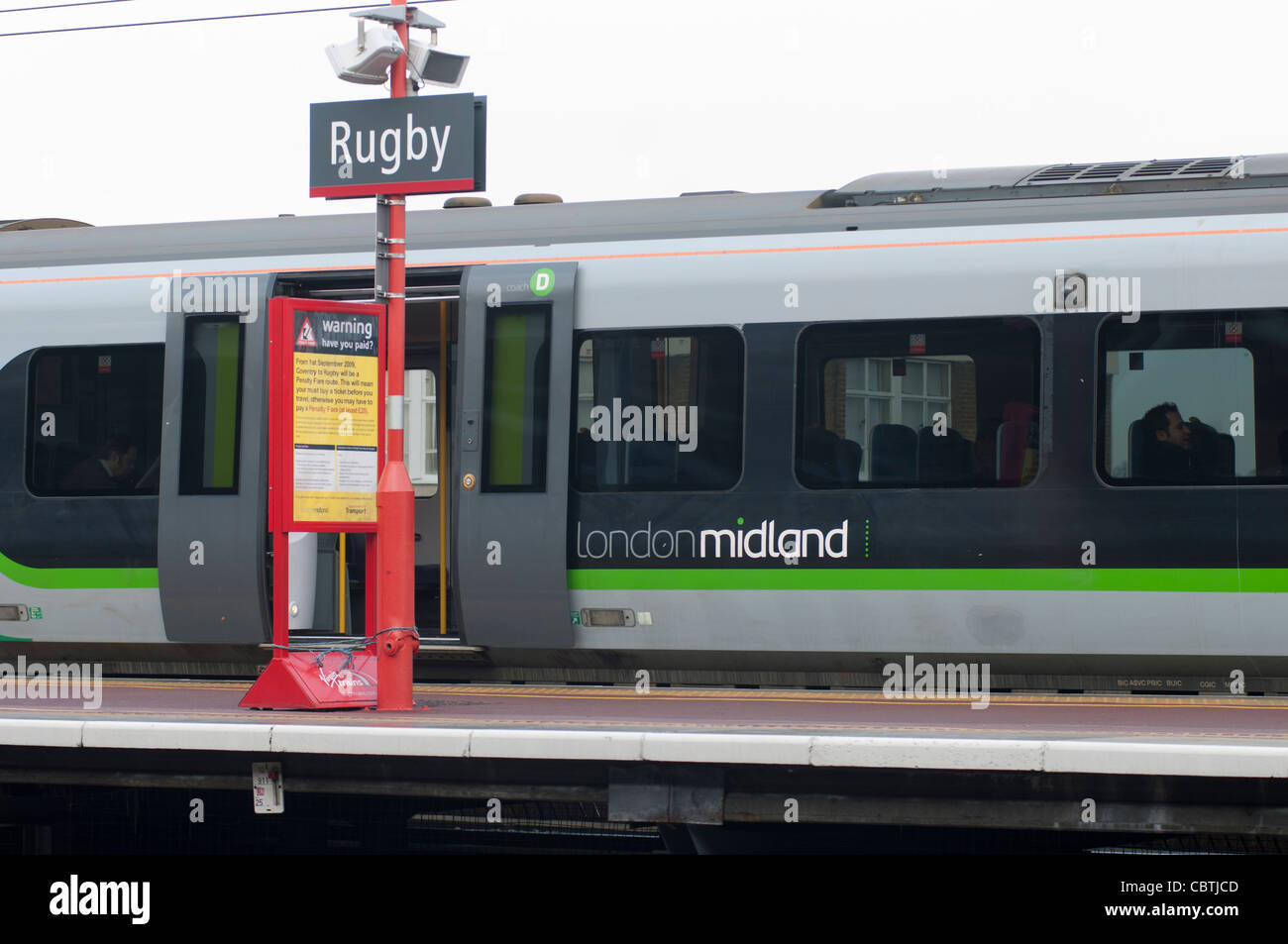London Midland electric train at Rugby railway station, Warwickshire ...