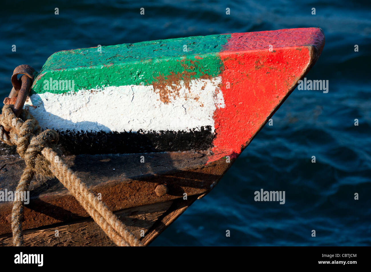 Prow of Abra ferry  painted with flag of United Arab Emirates Dubai in United Arab Emirates Stock Photo
